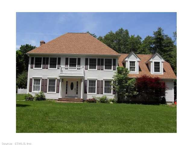 Exterior Front. Beautiful hip roof colonial set on 2 lovely acres.