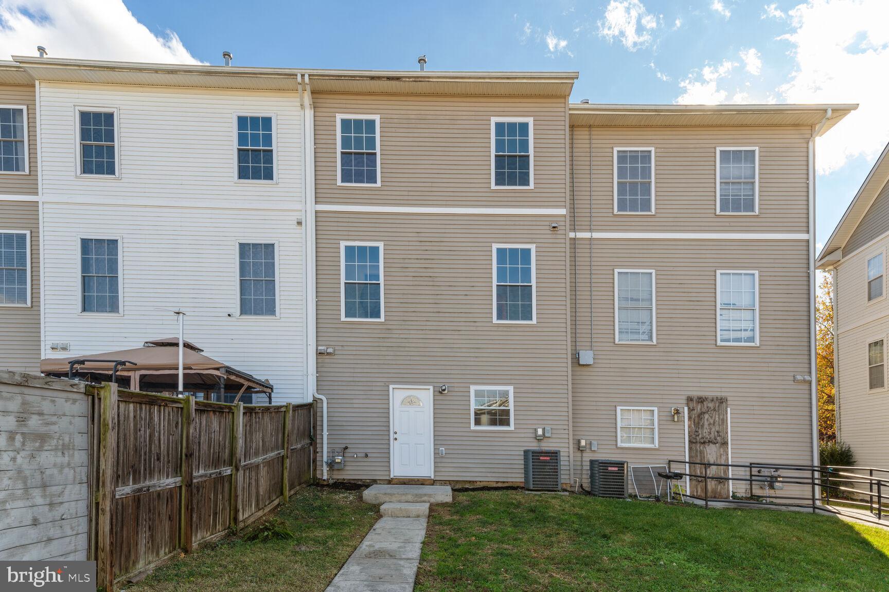 1510 Tubman Road Southeast Washington, DC 20020 - Photo 19 of 24 a front view of a house with a yard