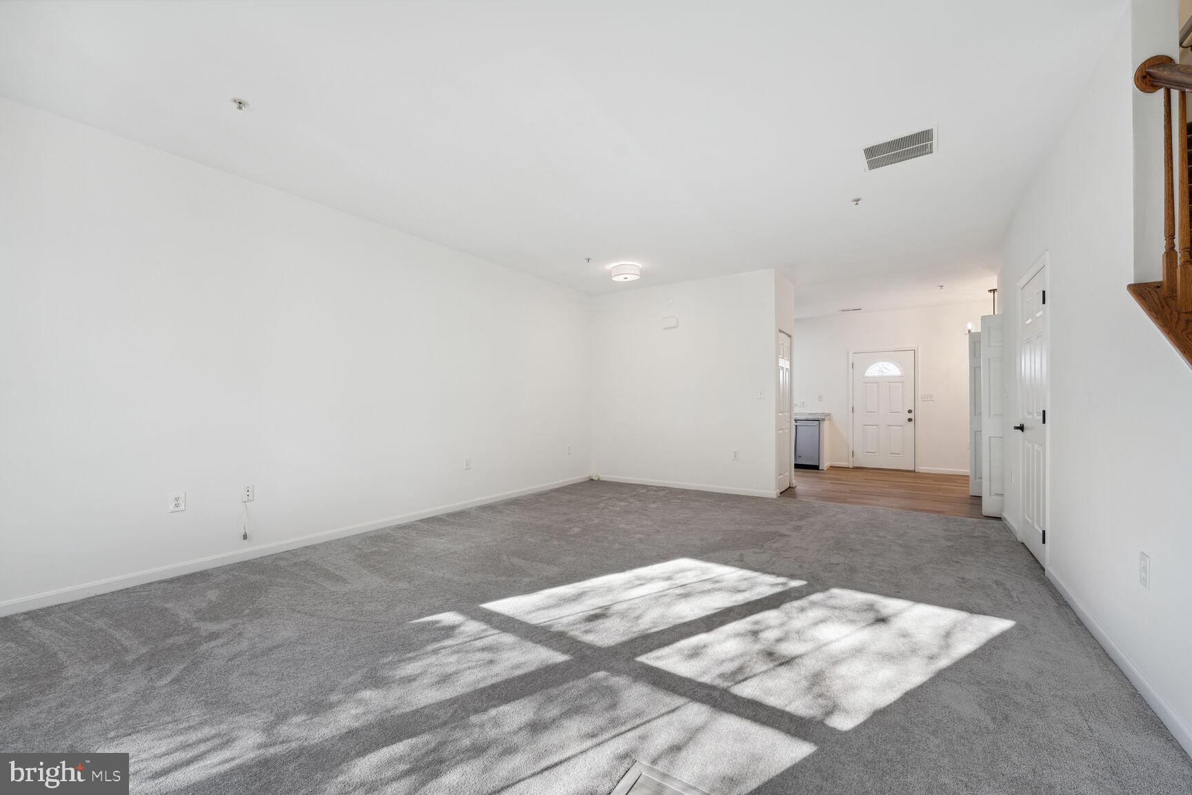 1510 Tubman Road Southeast Washington, DC 20020 - Photo 2 of 24 an empty room with a kitchen space and a sink