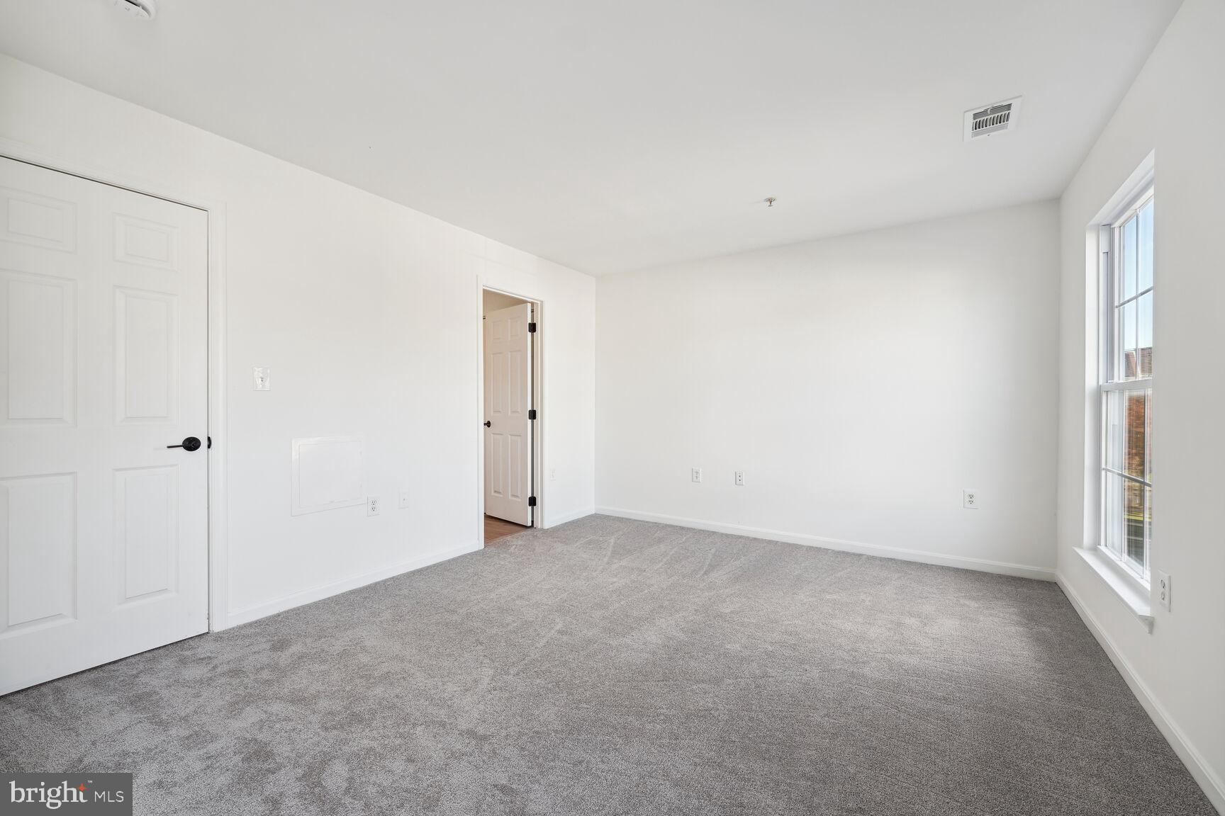 1510 Tubman Road Southeast Washington, DC 20020 - Photo 9 of 24 a view of an empty room with a window