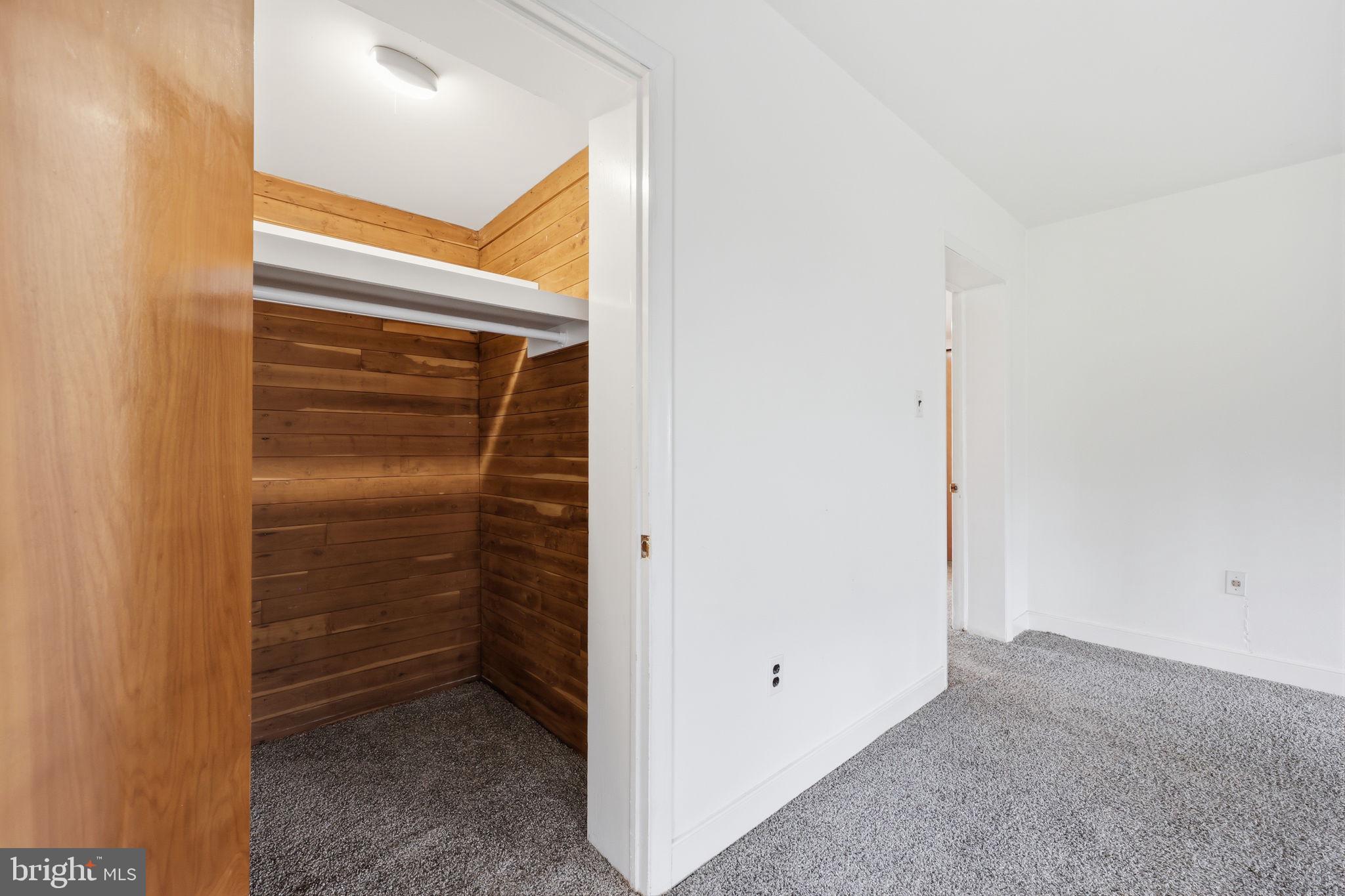 25 Diverty Road Pennington, NJ 08534 - Photo 12 of 37 Spacious closet with warm wood accents.