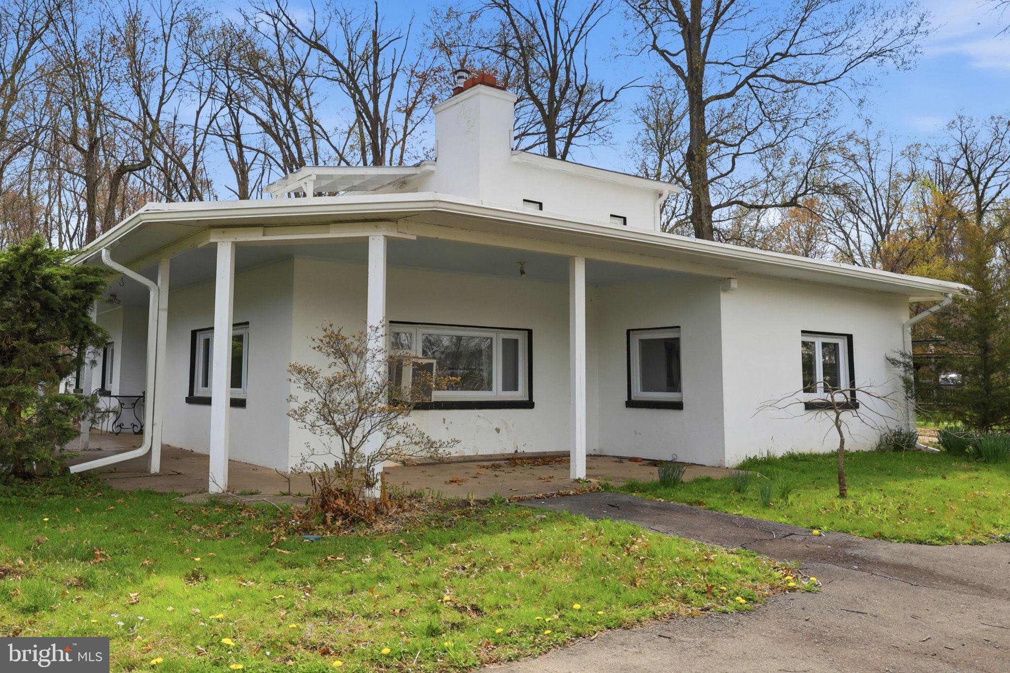 25 Diverty Road Pennington, NJ 08534 - Photo 2 of 37 Charming home nestled in nature's embrace.