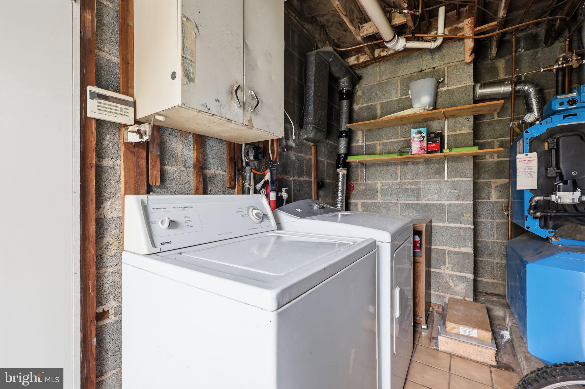 25 Diverty Road Pennington, NJ 08534 - Photo 24 of 37 Functional laundry space with storage.