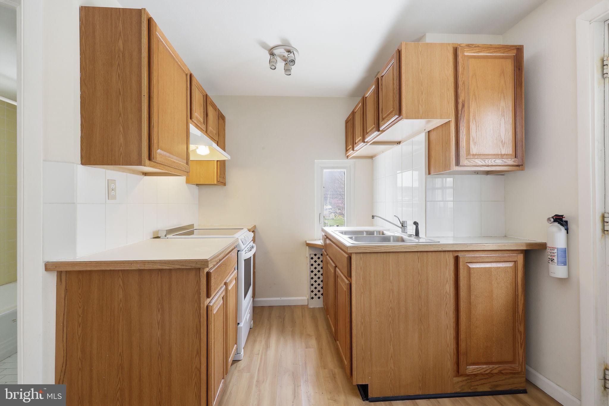 25 Diverty Road Pennington, NJ 08534 - Photo 30 of 37 Cozy kitchen with warm wood accents.
