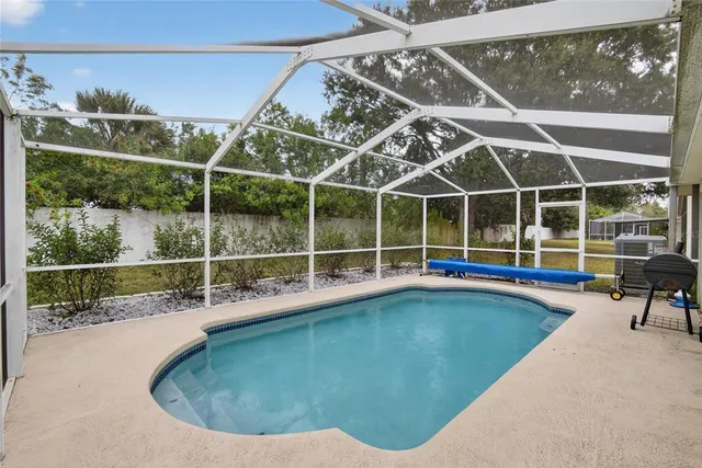 a view of outdoor space with trees all around