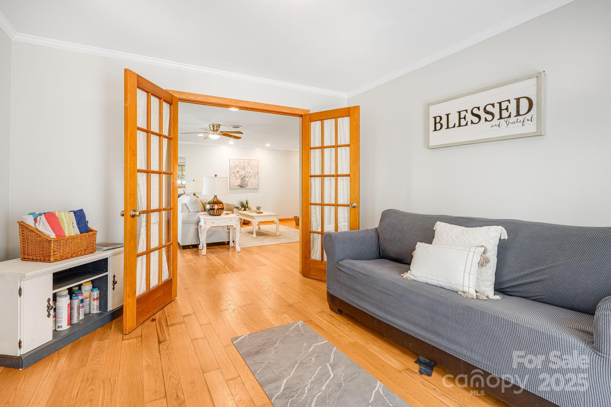 620 Mason Branch Road Bryson City, NC 28713 - Photo 11 of 43 a living room with furniture and a flat screen tv