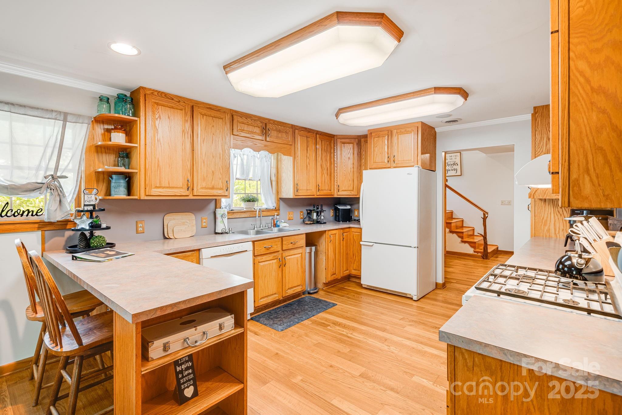 620 Mason Branch Road Bryson City, NC 28713 - Photo 14 of 43 a kitchen with a sink appliances and cabinets