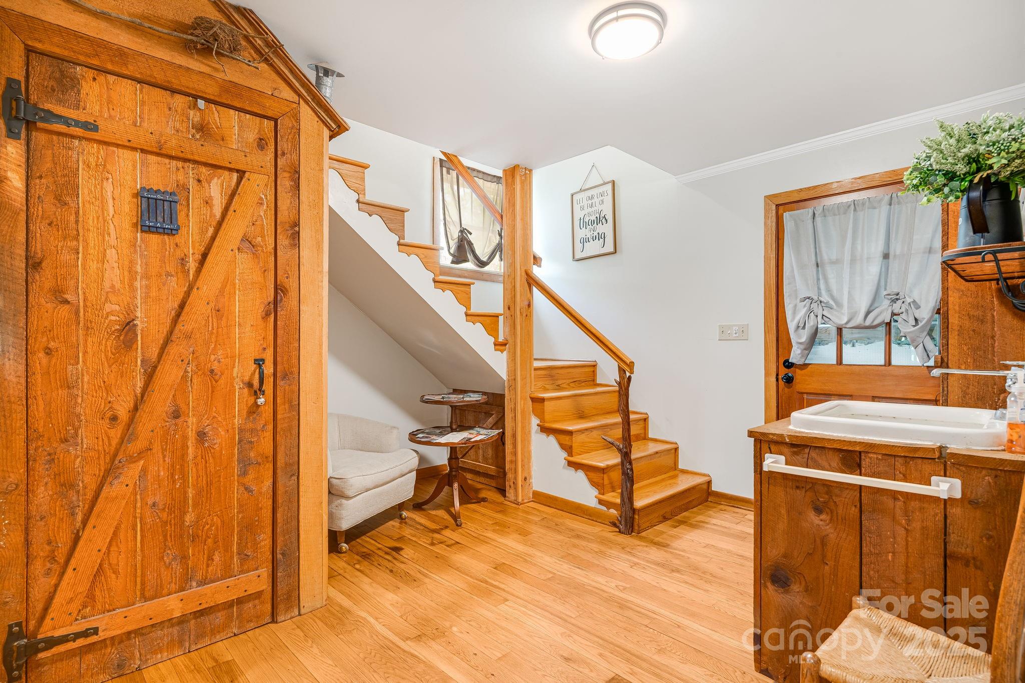 620 Mason Branch Road Bryson City, NC 28713 - Photo 23 of 43 a view of entryway and hall with wooden floor