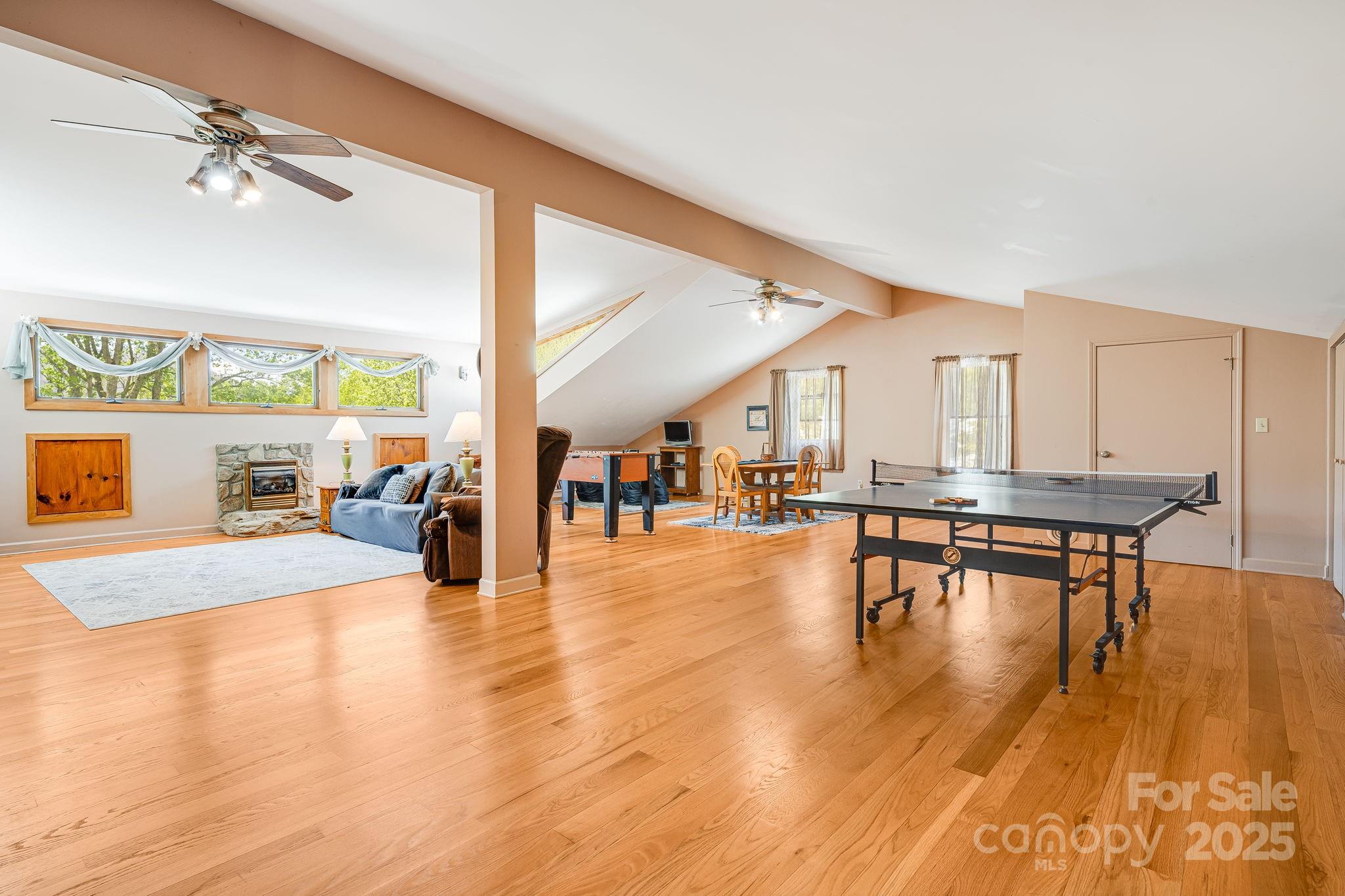620 Mason Branch Road Bryson City, NC 28713 - Photo 30 of 43 a view of a living room filled with furniture and wooden floor