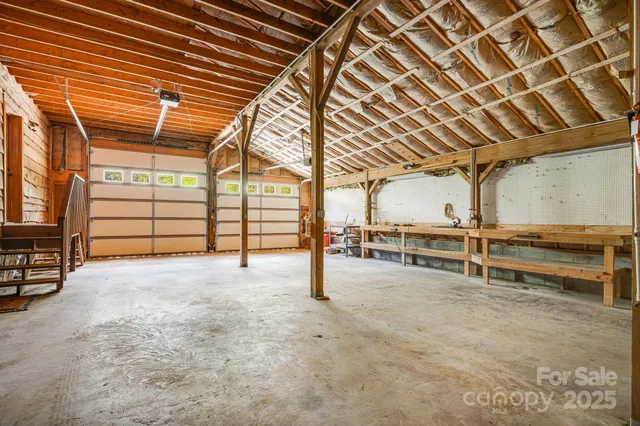 a view of an empty room with racks on the wall