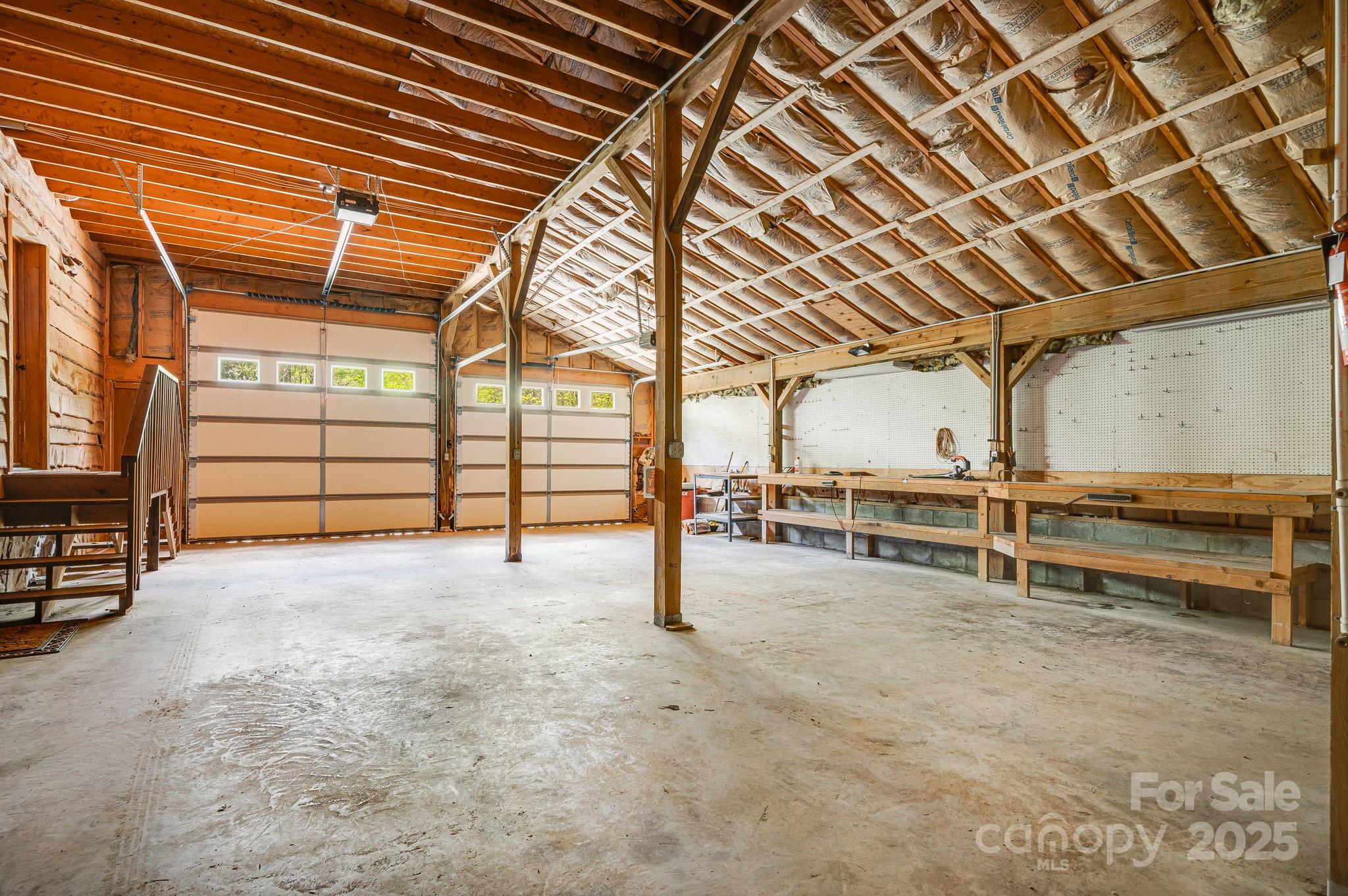 620 Mason Branch Road Bryson City, NC 28713 - Photo 34 of 43 a view of an empty room with racks on the wall