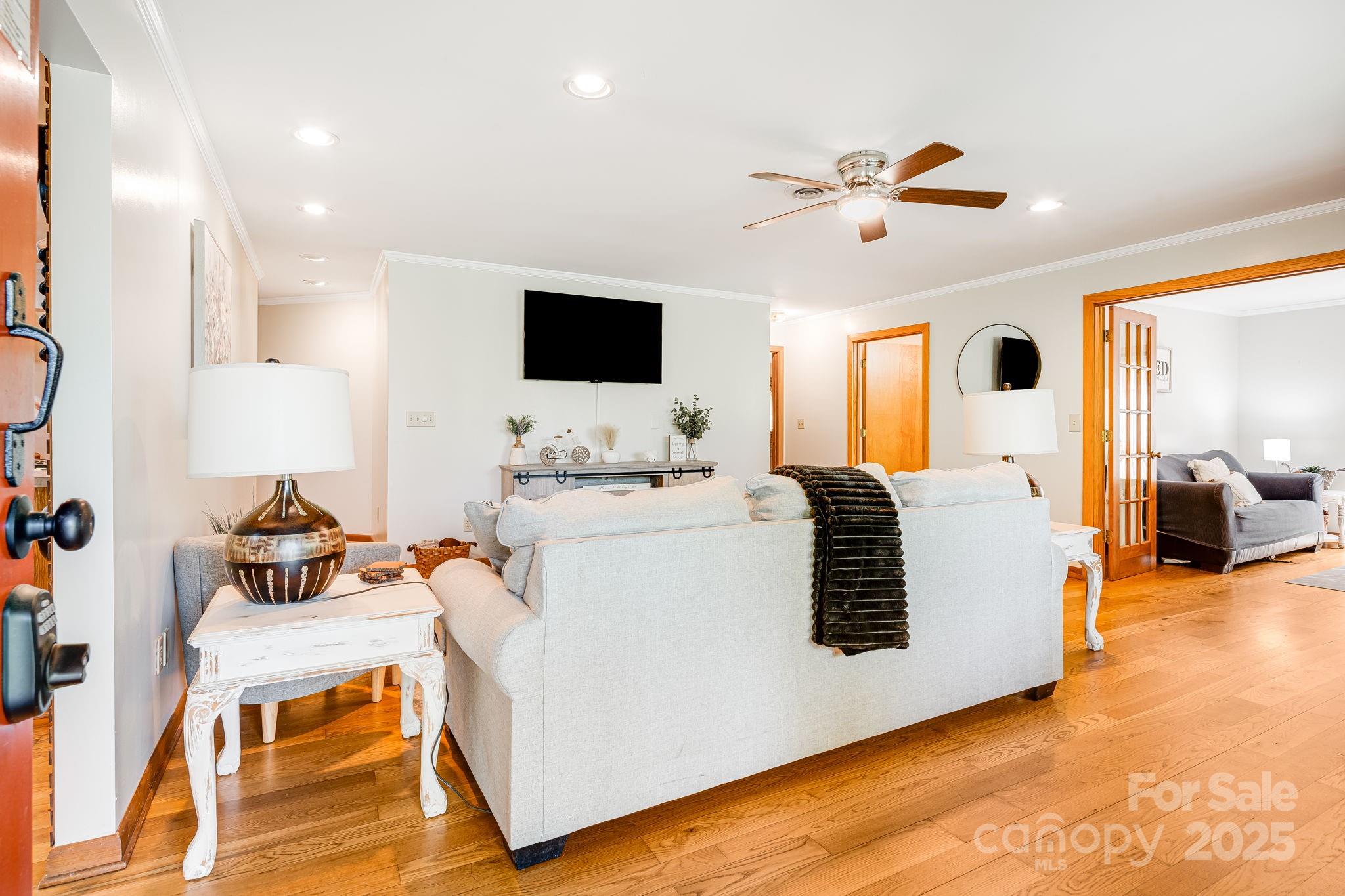 620 Mason Branch Road Bryson City, NC 28713 - Photo 6 of 43 a living room with furniture and a flat screen tv