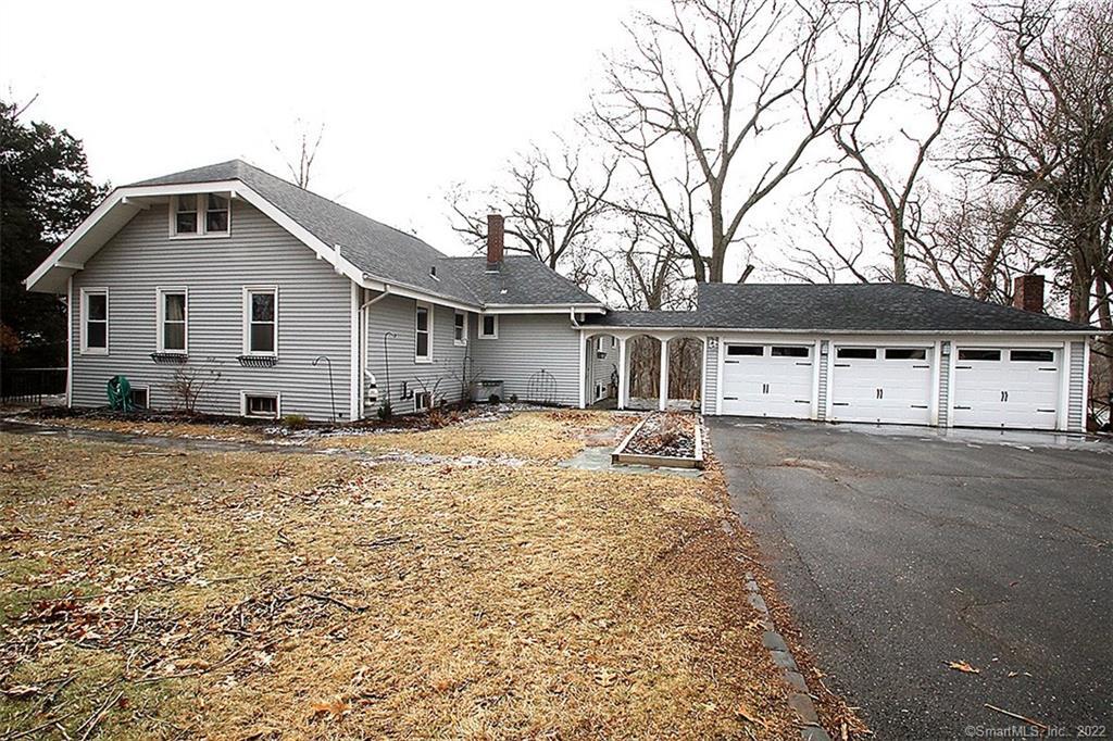 16 Bromley Court Hamden, CT 06514 - Photo 1 of 1 a view of a house with a yard