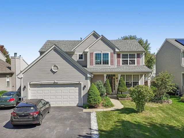 a car parked in front of a house