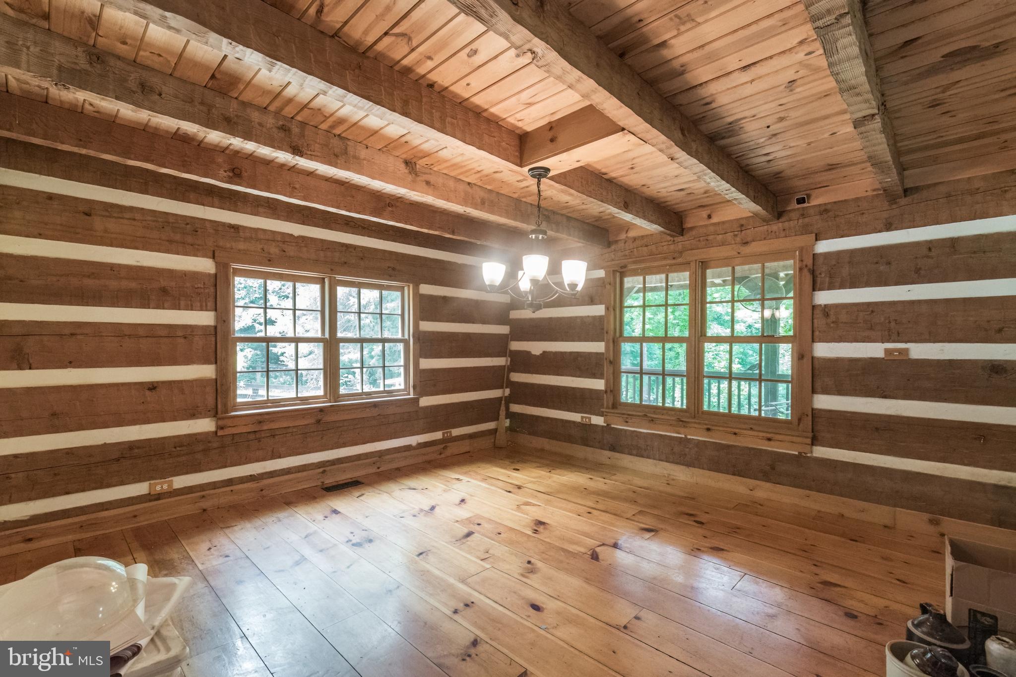 gleaming hardwood floors have polyurethane finish