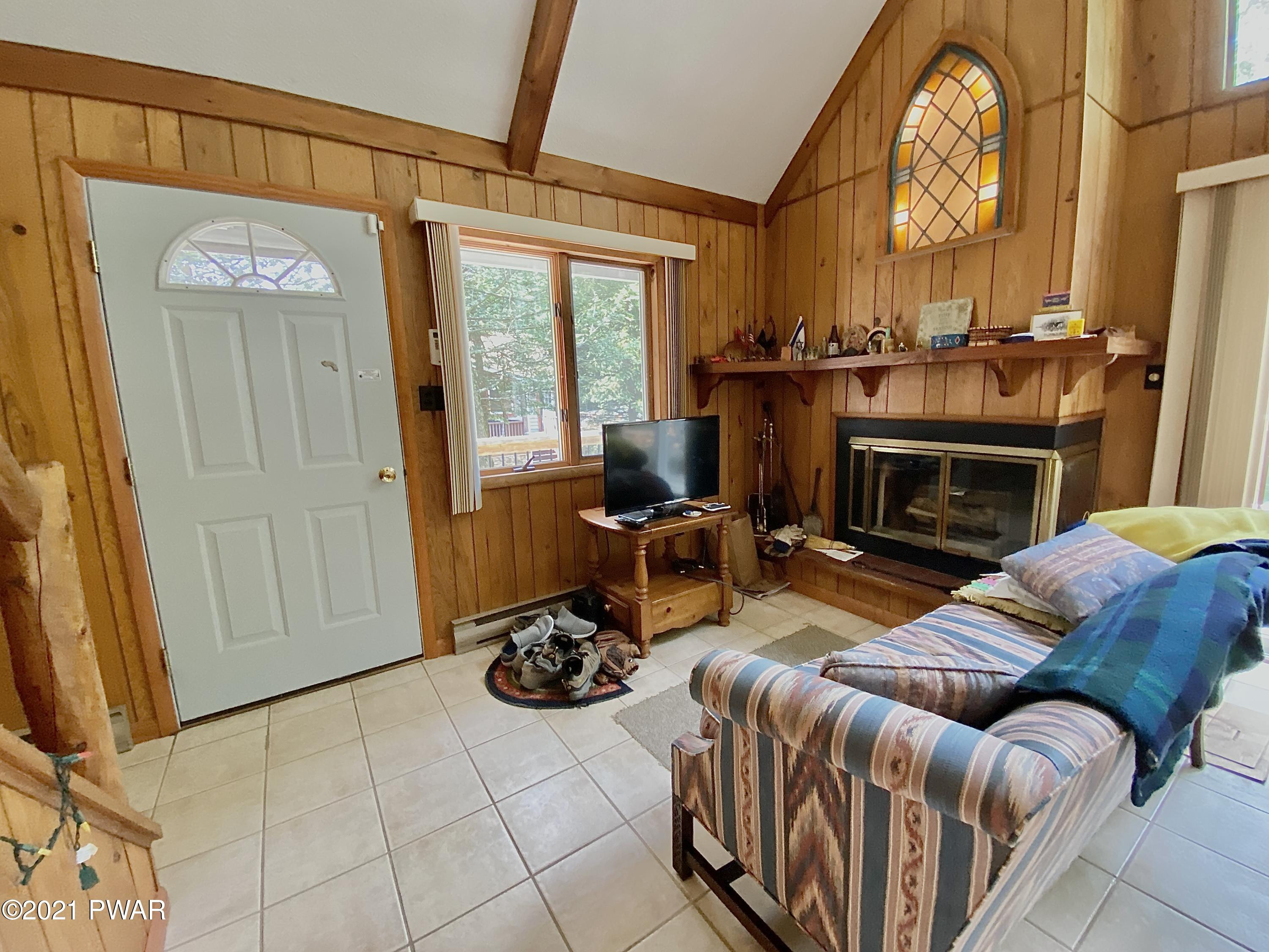 Entrance/Wood Burning Fireplace