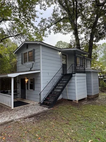 a front view of a house with garage