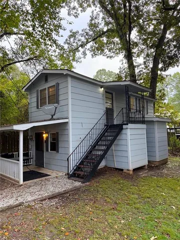 a front view of a house with garage
