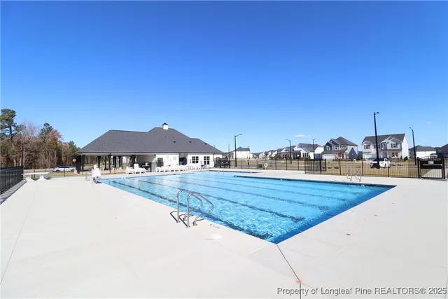 a view of a swimming pool with an ocean view