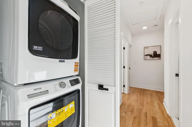 a view of bathroom with washer and dryer