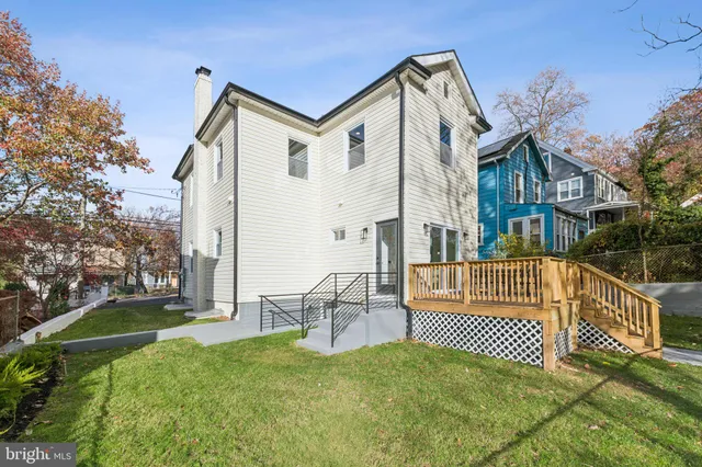 a view of a house with a fence