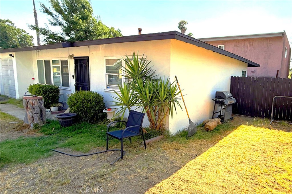 4603 Jurupa Avenue Riverside, CA 92506 - Photo 3 of 8 a view of a backyard with plants and patio