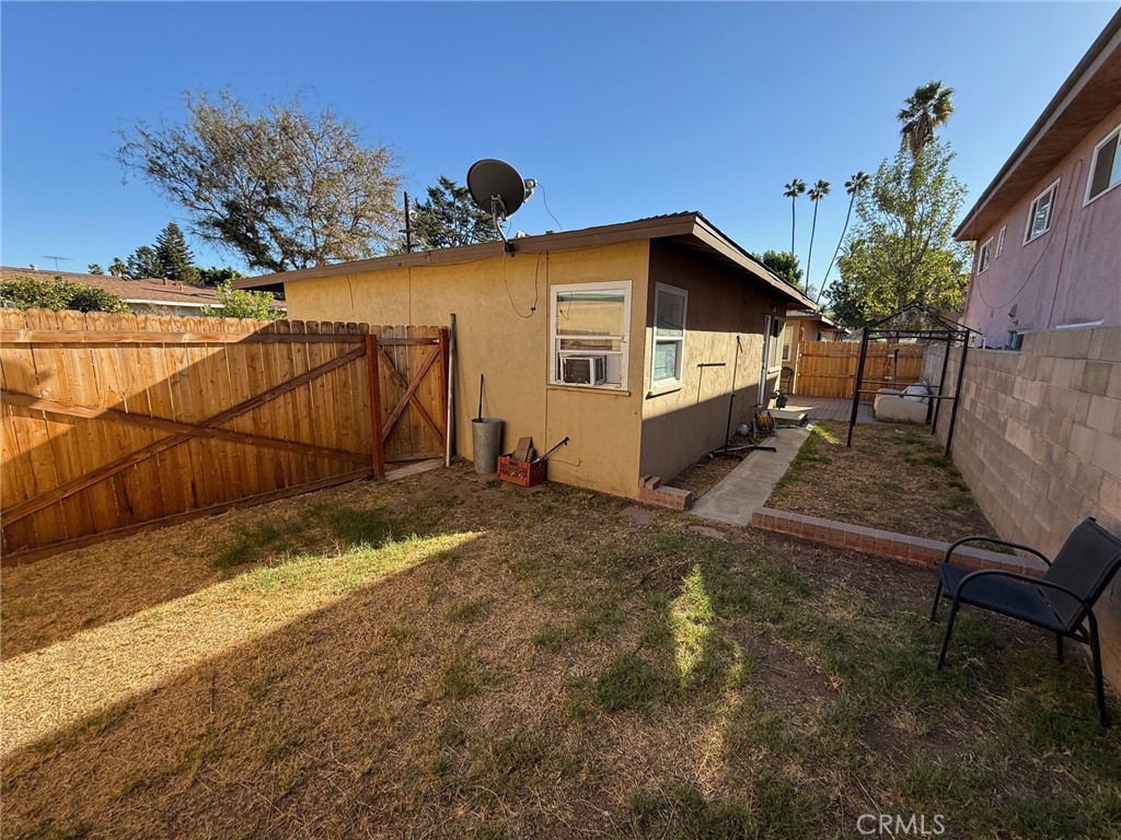 4603 Jurupa Avenue Riverside, CA 92506 - Photo 7 of 8 a house view with a backyard space