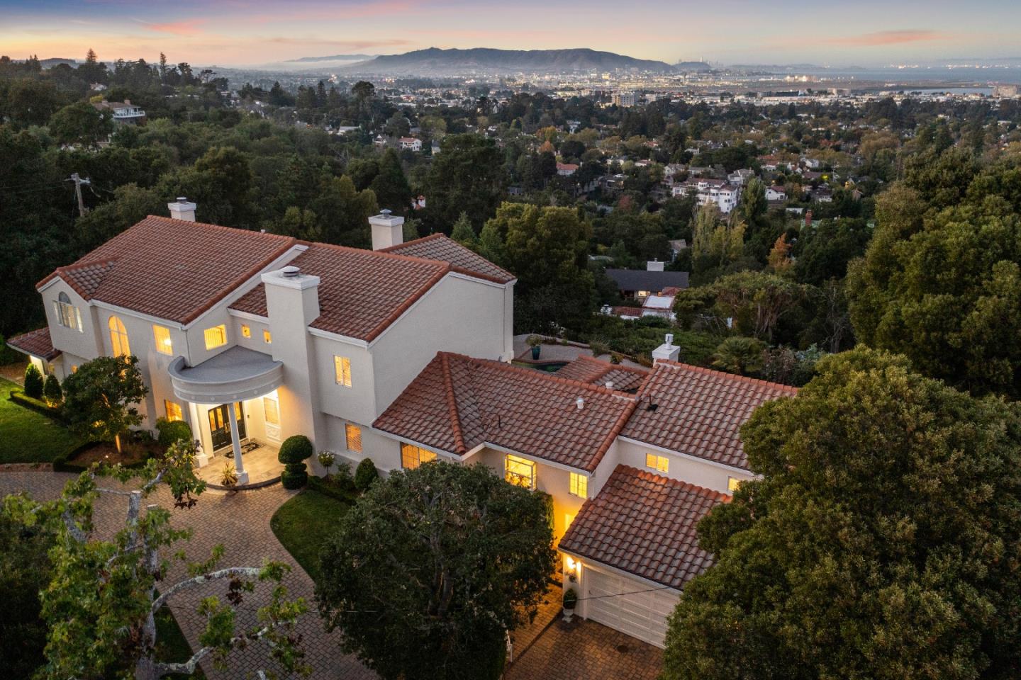 an aerial view of a house with a garden