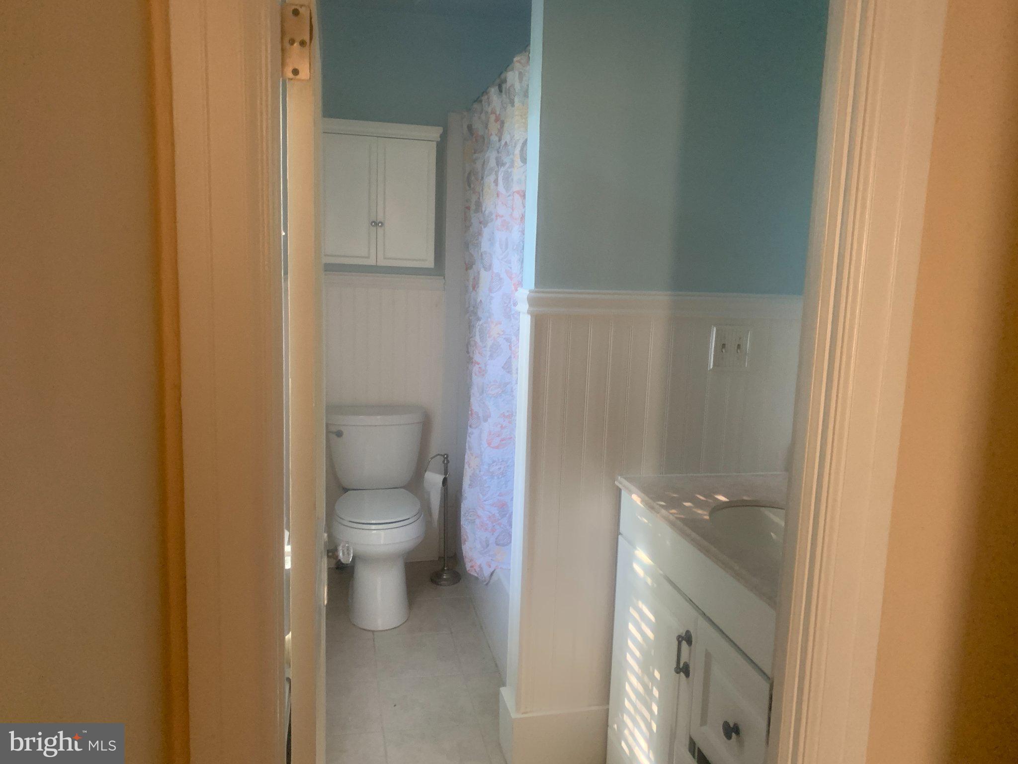 915 Stone Road, Unit A Laurel Springs, NJ 08021 - Photo 13 of 13 a bathroom with a toilet