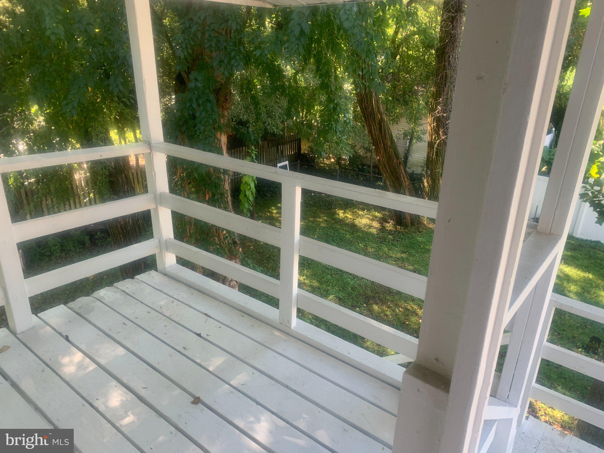915 Stone Road, Unit A Laurel Springs, NJ 08021 - Photo 9 of 13 a view of balcony with wooden floor