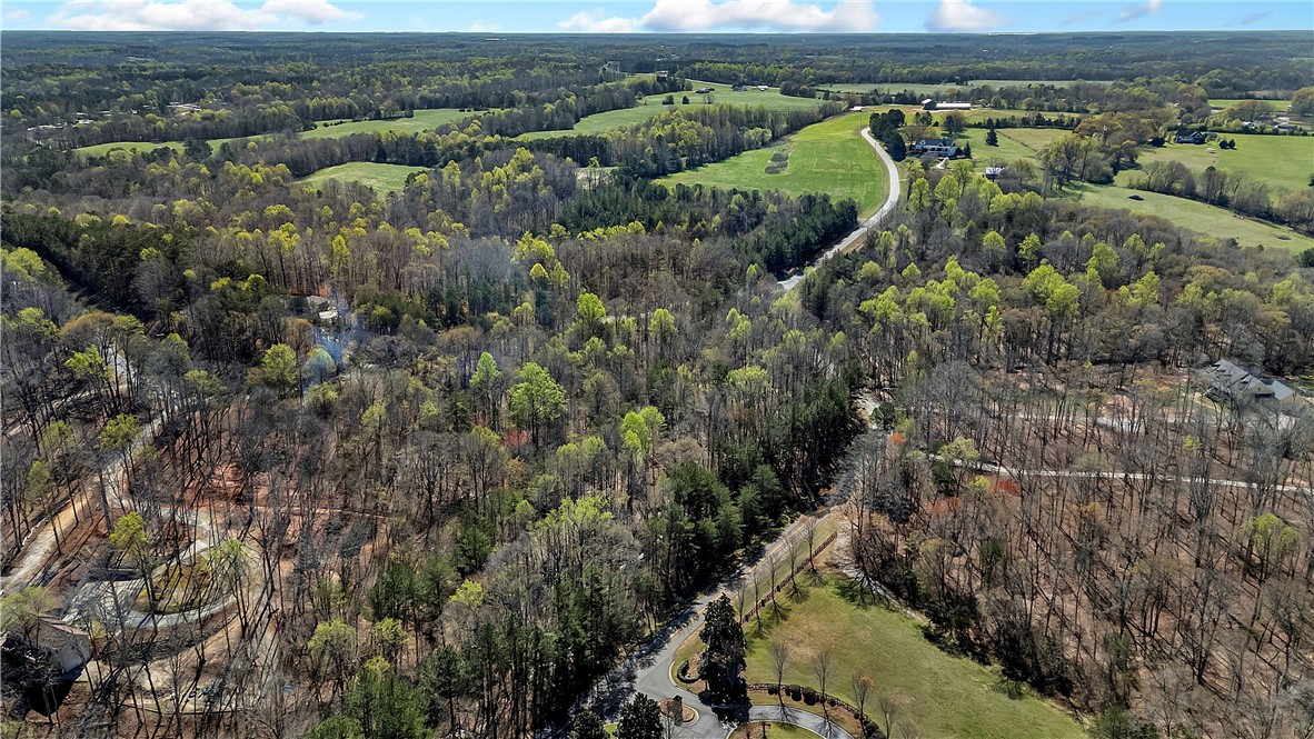 3.271 Coneross Point Drive Seneca, SC 29678 - Photo 6 of 9 Expansive acreage provides a verdant backdrop for serene living.