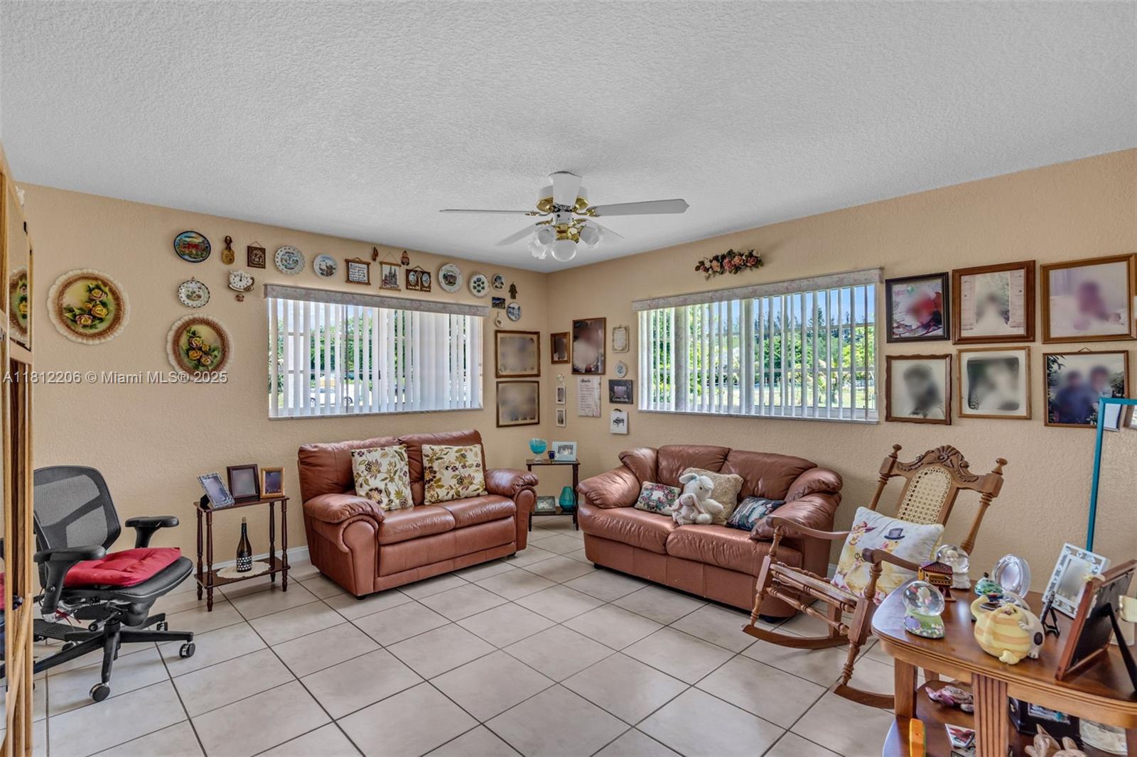 17550 Southwest 59th Court Southwest Ranches, FL 33331 - Photo 11 of 51 a living room with furniture and a window