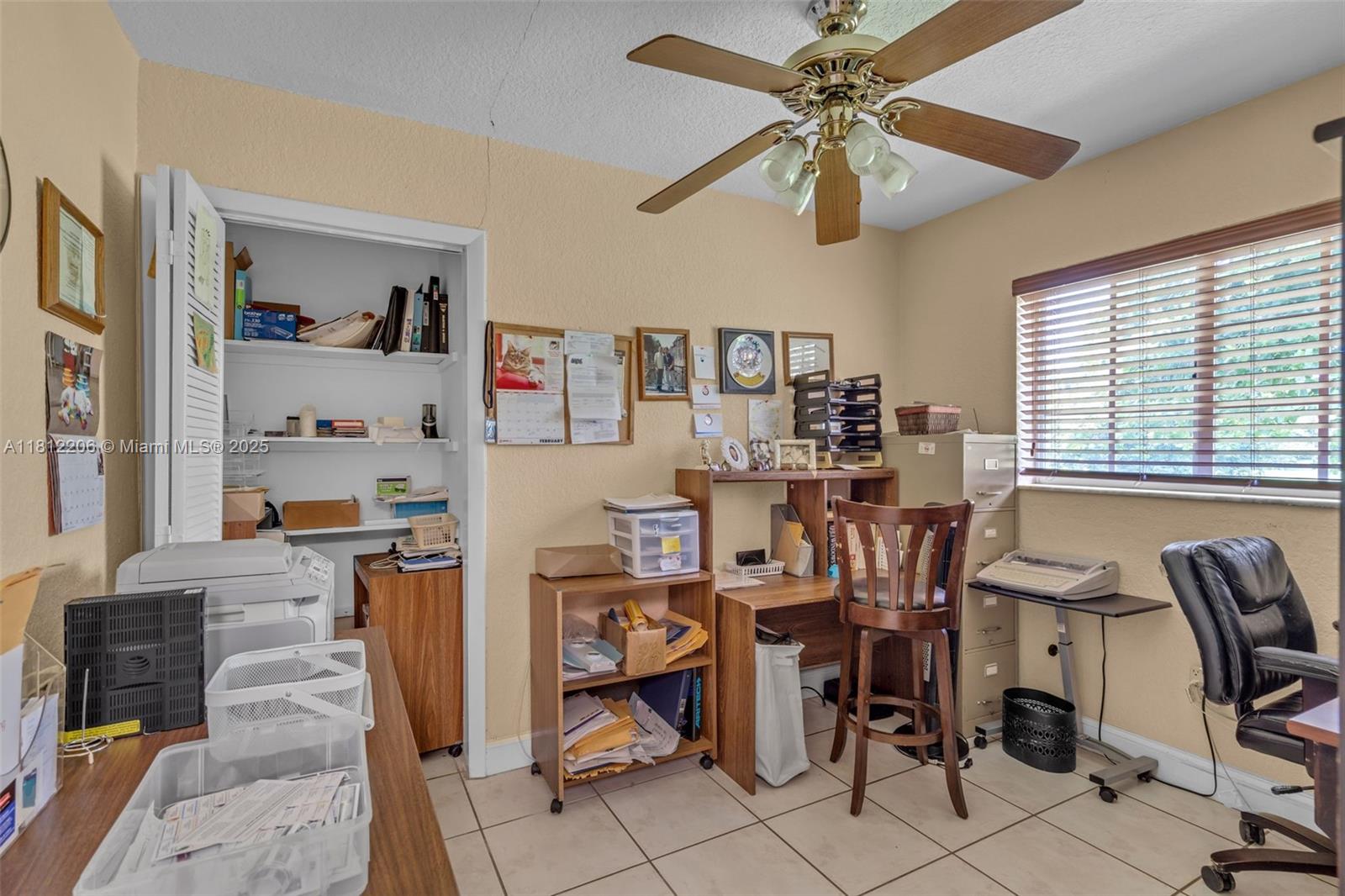 17550 Southwest 59th Court Southwest Ranches, FL 33331 - Photo 17 of 51 a view of a workspace with furniture and a window