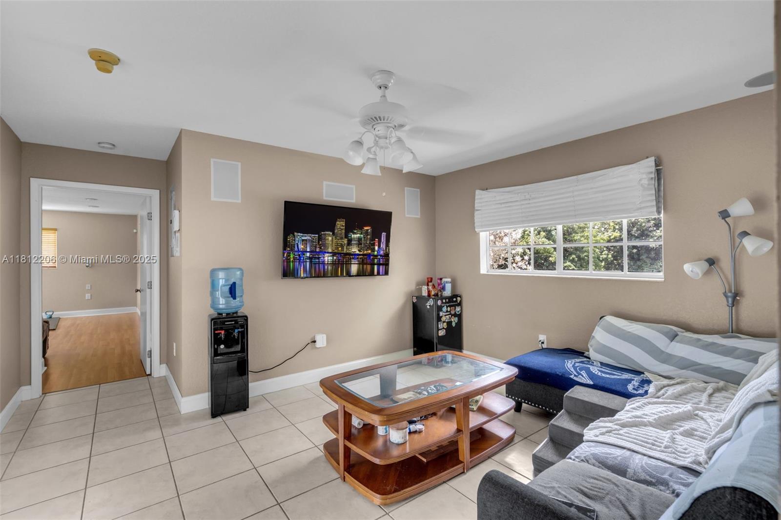 17550 Southwest 59th Court Southwest Ranches, FL 33331 - Photo 19 of 51 a living room with furniture and a window