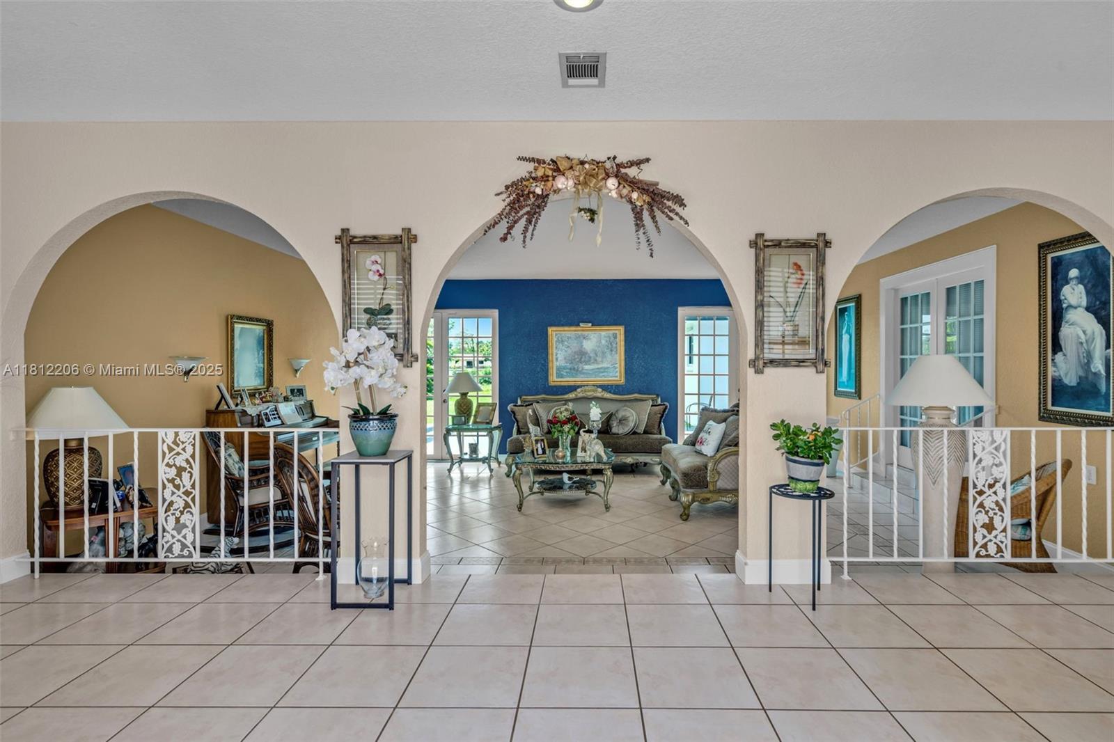 17550 Southwest 59th Court Southwest Ranches, FL 33331 - Photo 7 of 51 a view of a entryway door with dining room