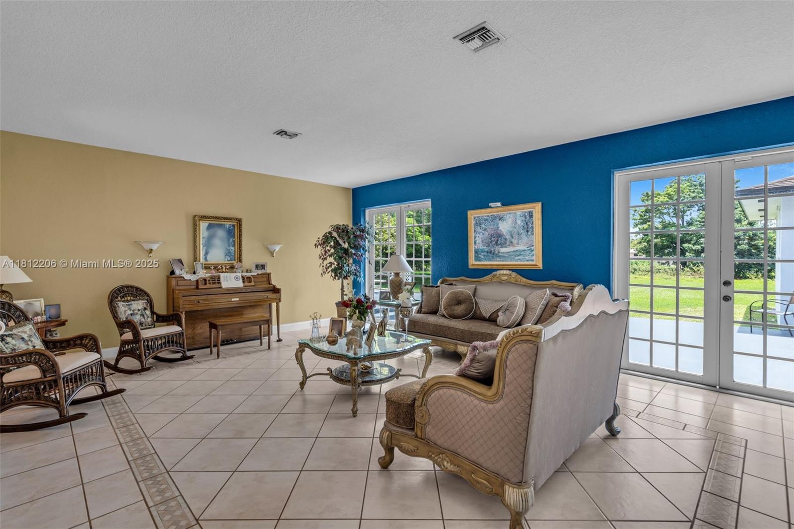 17550 Southwest 59th Court Southwest Ranches, FL 33331 - Photo 8 of 51 a living room with furniture and a window