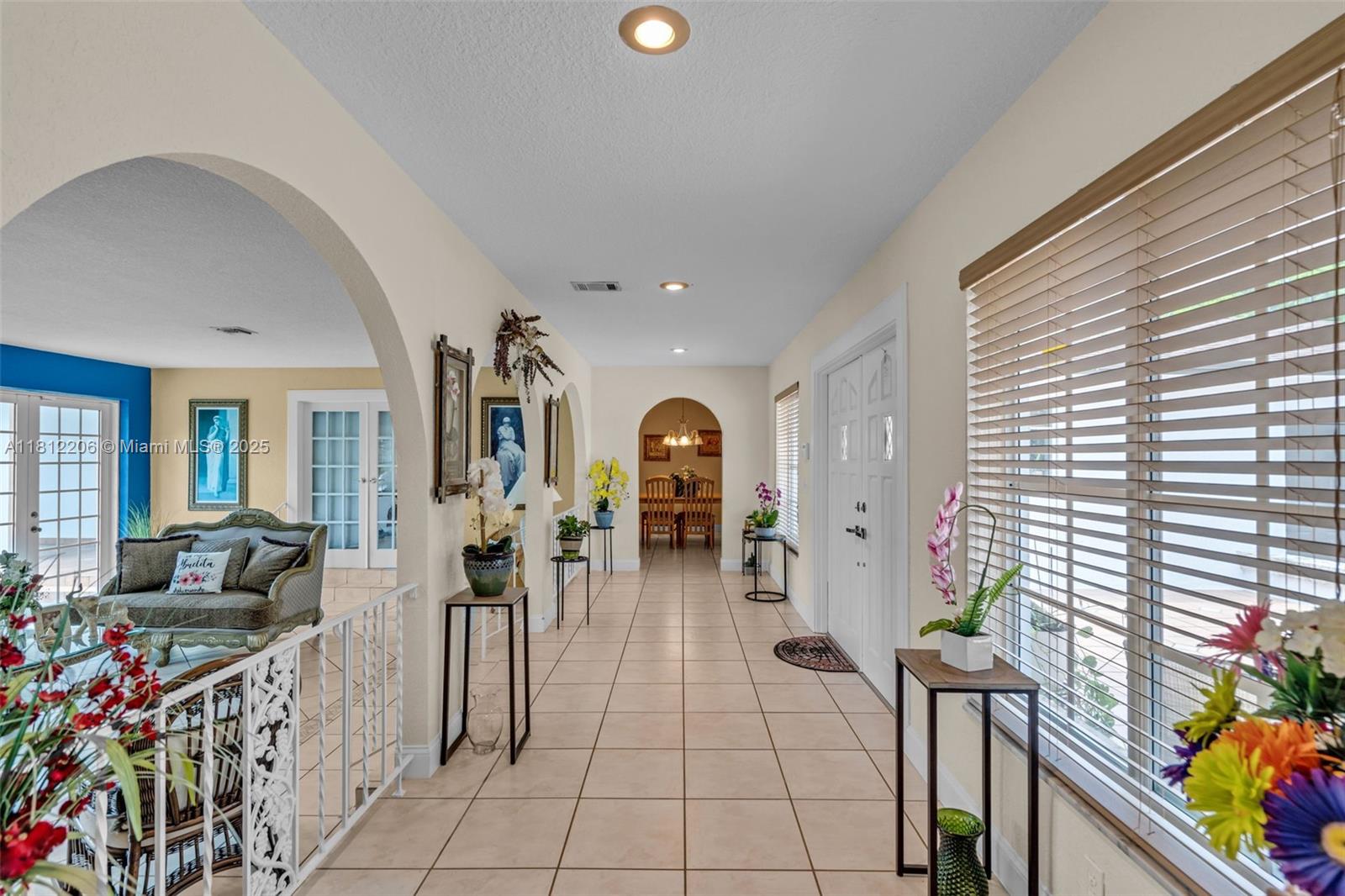 17550 Southwest 59th Court Southwest Ranches, FL 33331 - Photo 10 of 51 a lobby with furniture and a potted plant