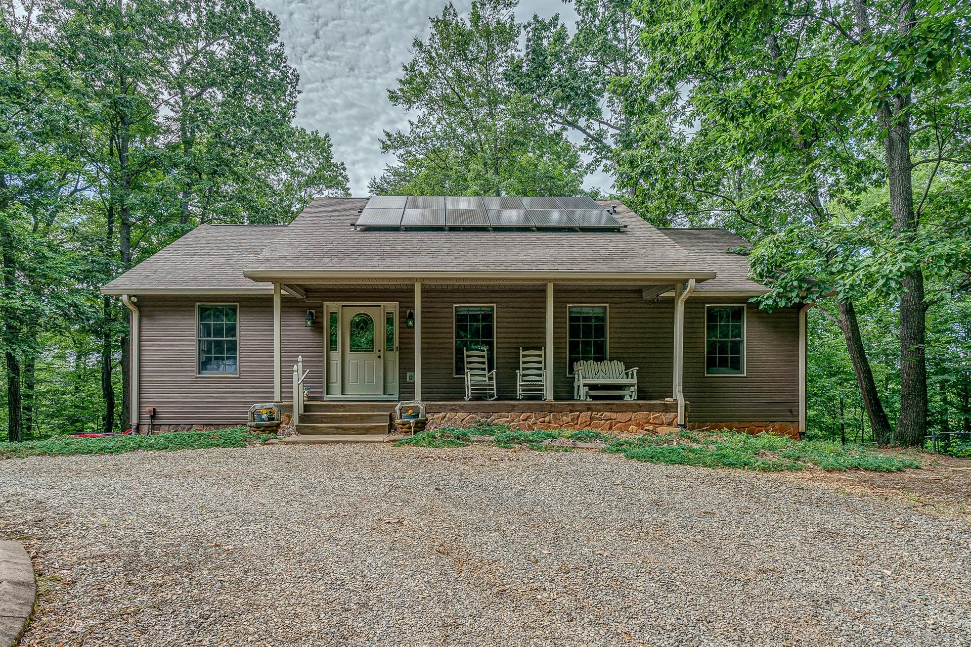684 Northridge Road Hardy, VA 24101 - Photo 1 of 75 a front view of a house with a garden