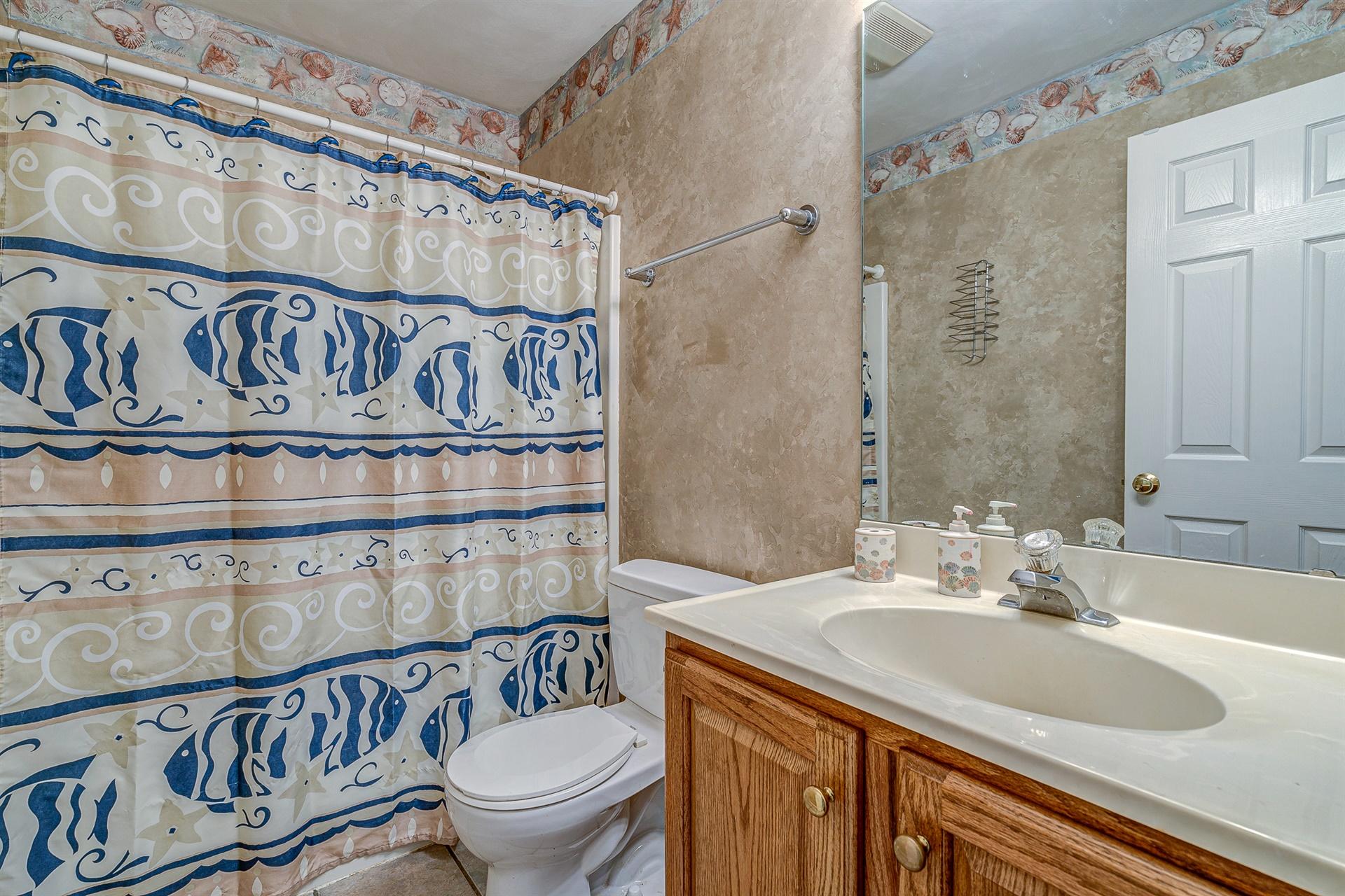 684 Northridge Road Hardy, VA 24101 - Photo 19 of 75 a bathroom with a granite countertop sink and a toilet