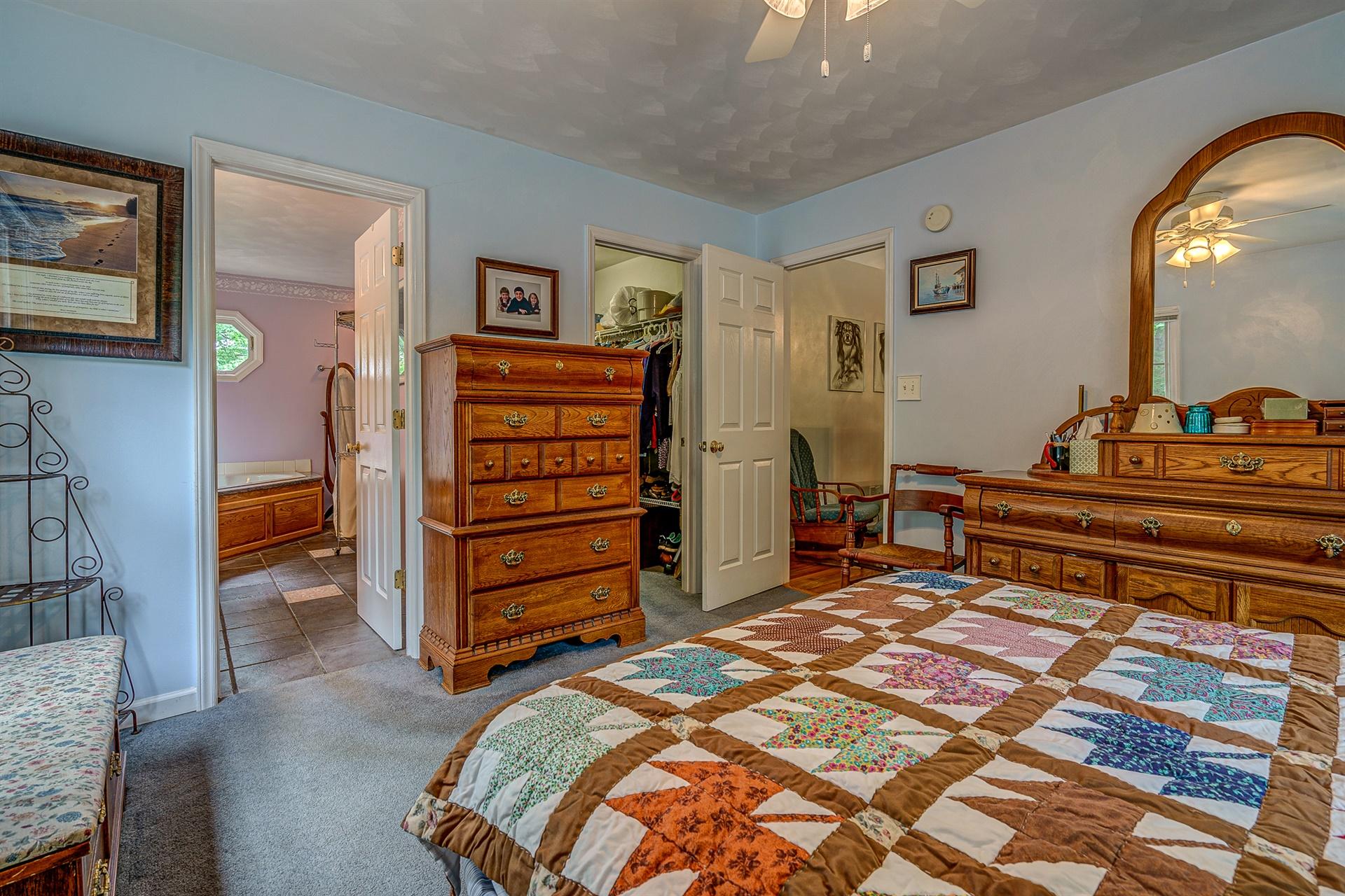 684 Northridge Road Hardy, VA 24101 - Photo 22 of 75 a bedroom with a bed and furniture