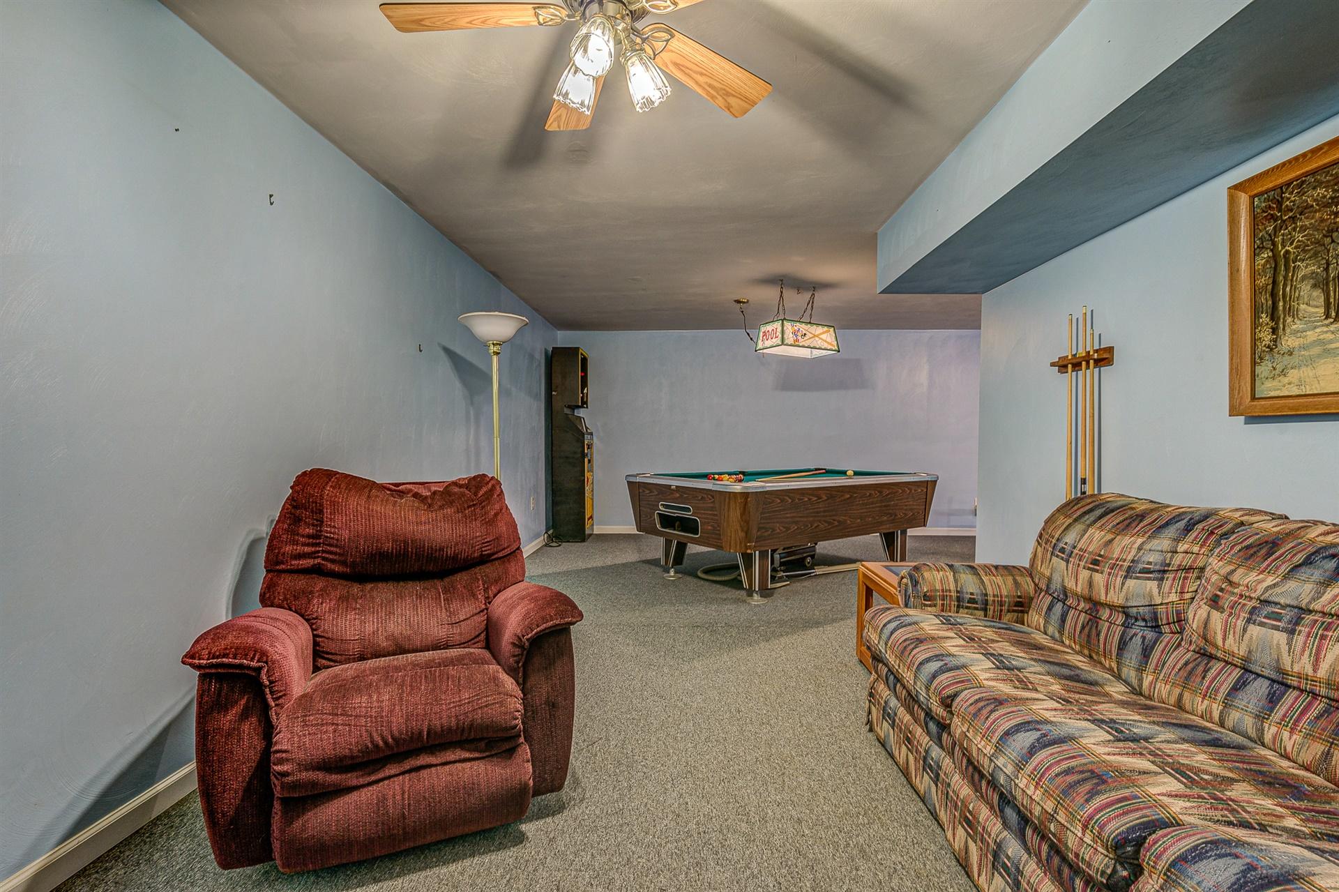684 Northridge Road Hardy, VA 24101 - Photo 30 of 75 a living room with furniture and a chandelier