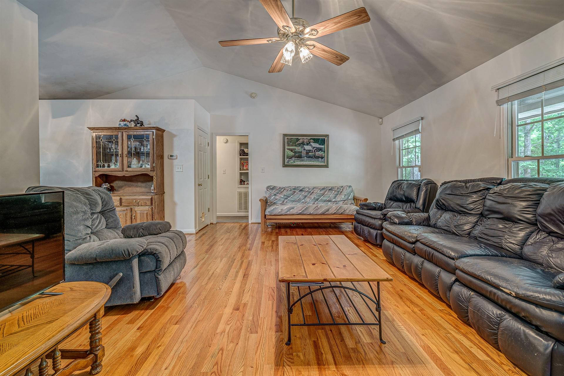 684 Northridge Road Hardy, VA 24101 - Photo 9 of 75 a living room with furniture and a wooden floor