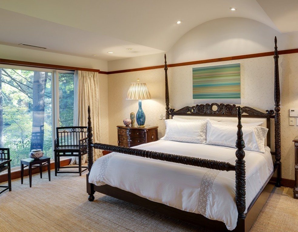 360-356 Great Meadows Road Concord, MA 01742 - Photo 15 of 22 a bedroom with a bed a table and chairs