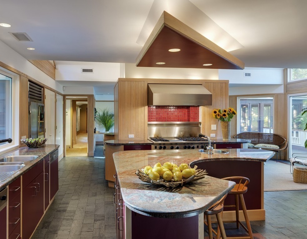 360-356 Great Meadows Road Concord, MA 01742 - Photo 9 of 22 a kitchen with a dining table and chairs