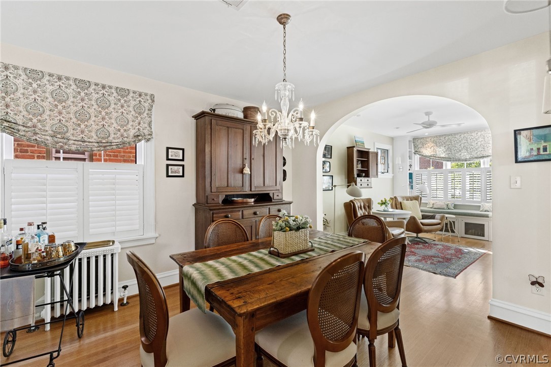 428 Roseneath Road Richmond, VA 23221 - Photo 11 of 40 a view of a dining room with furniture window and wooden floor