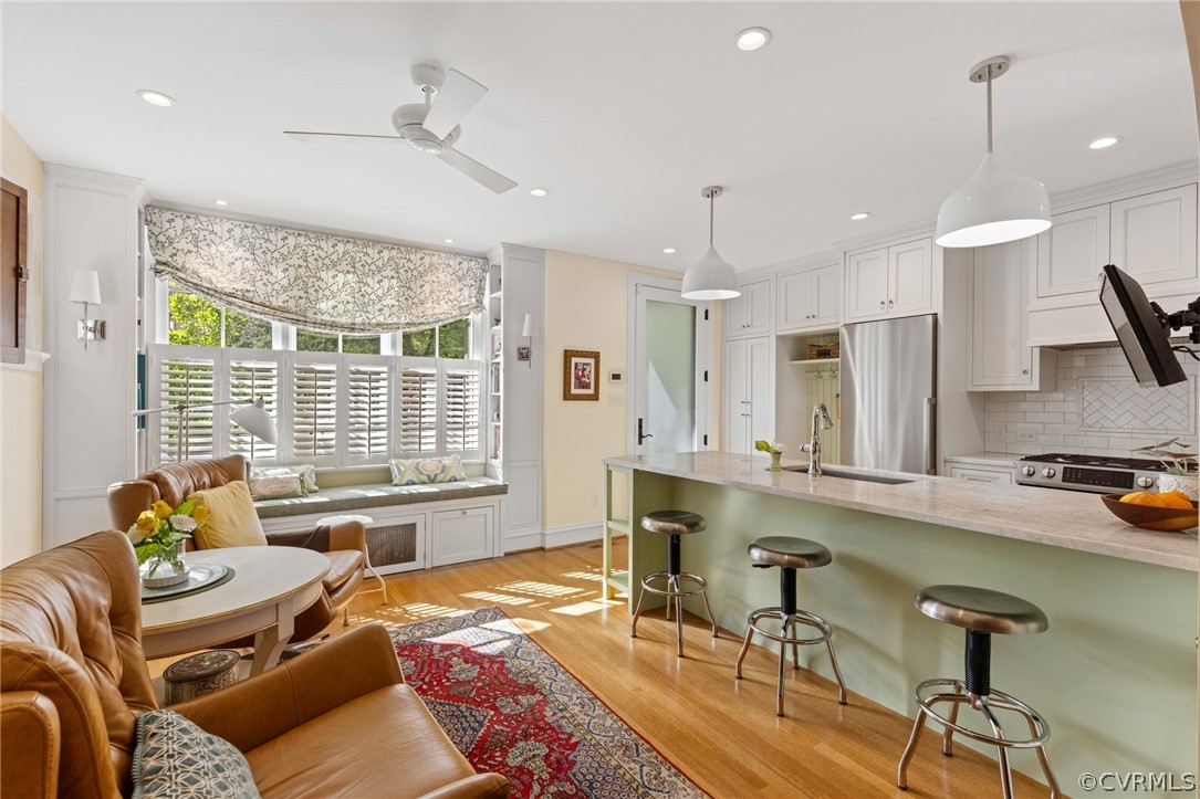 428 Roseneath Road Richmond, VA 23221 - Photo 14 of 40 a living room with furniture and a large window