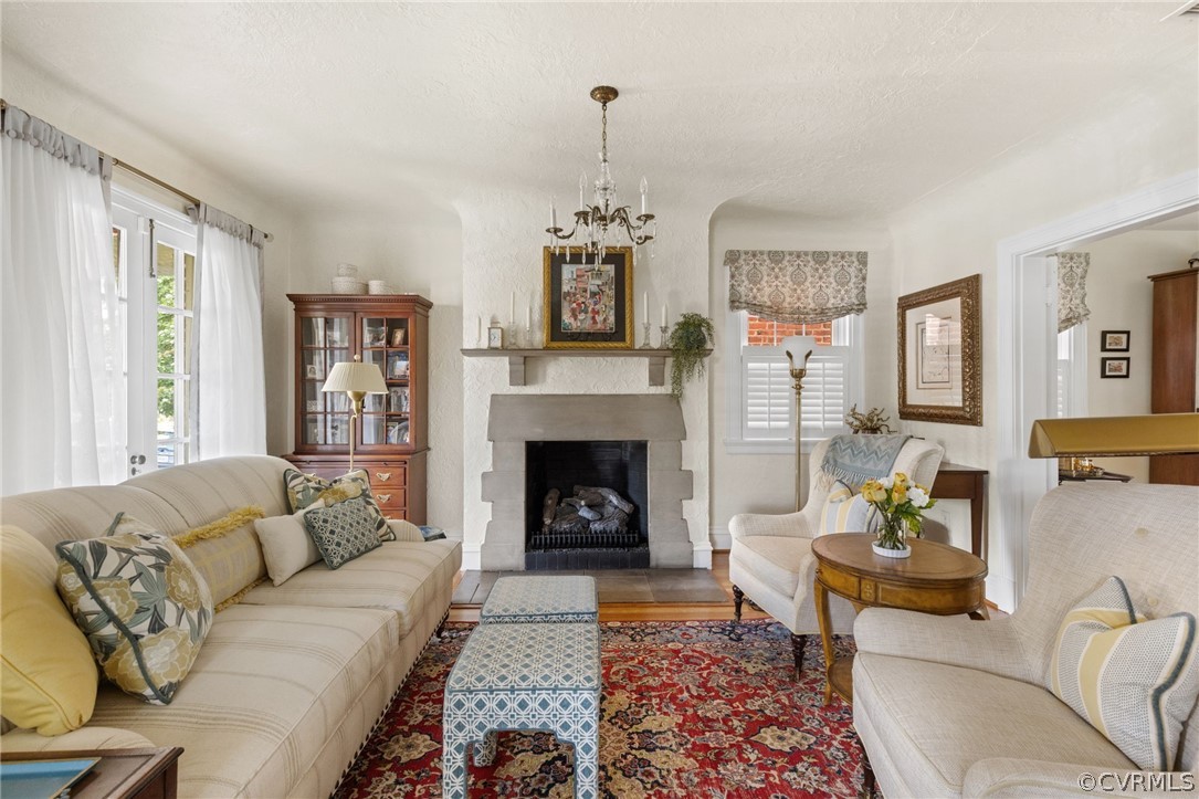 428 Roseneath Road Richmond, VA 23221 - Photo 8 of 40 a living room with furniture and a fireplace