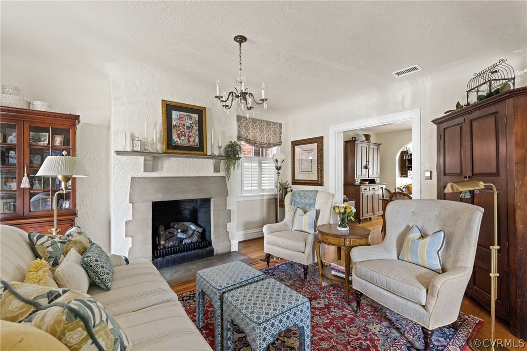 428 Roseneath Road Richmond, VA 23221 - Photo 9 of 40 a living room with furniture and a fireplace