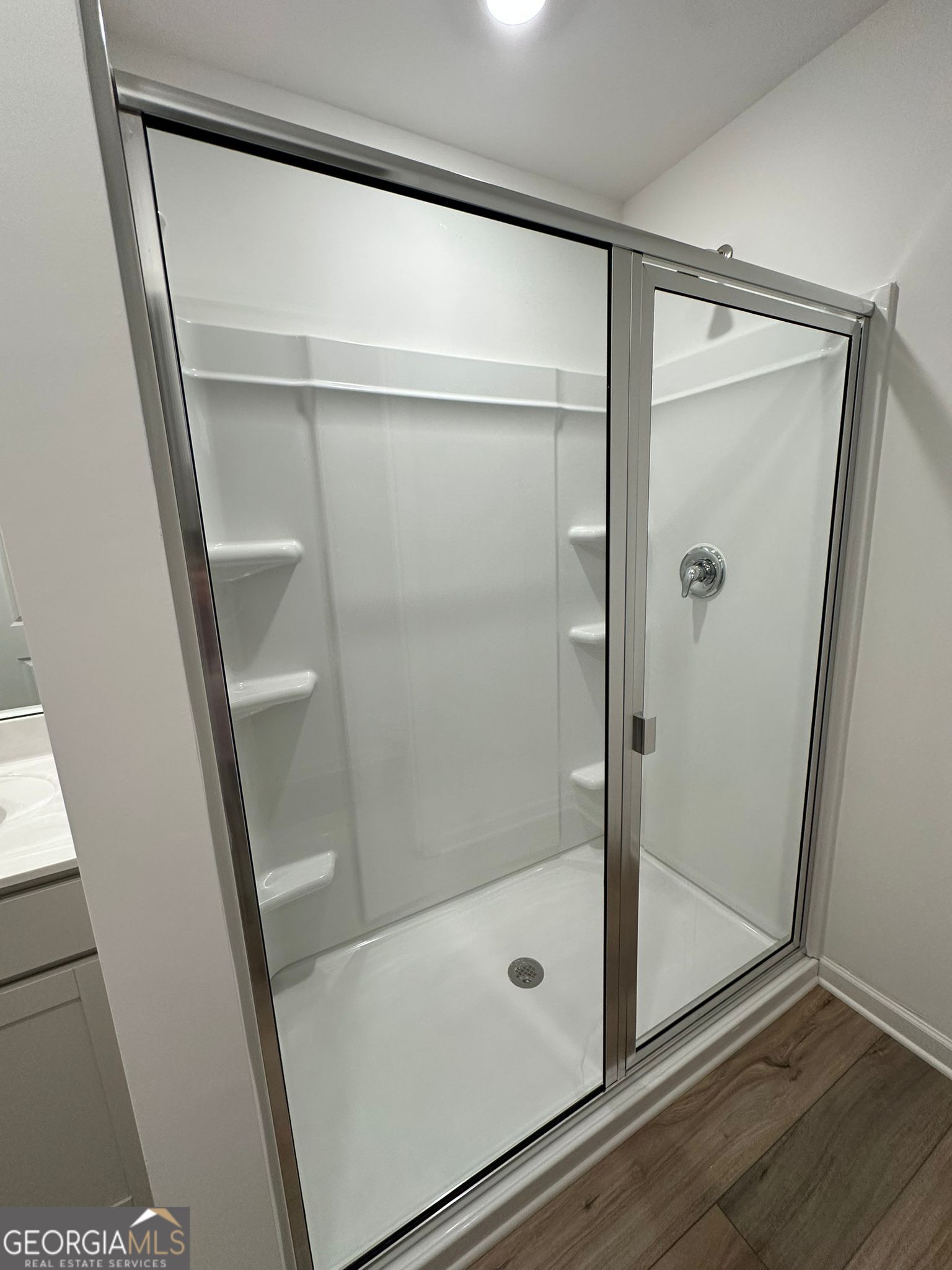 4281 Marsha Street Doraville, GA 30360 - Photo 33 of 38 a bathroom with a glass door shower