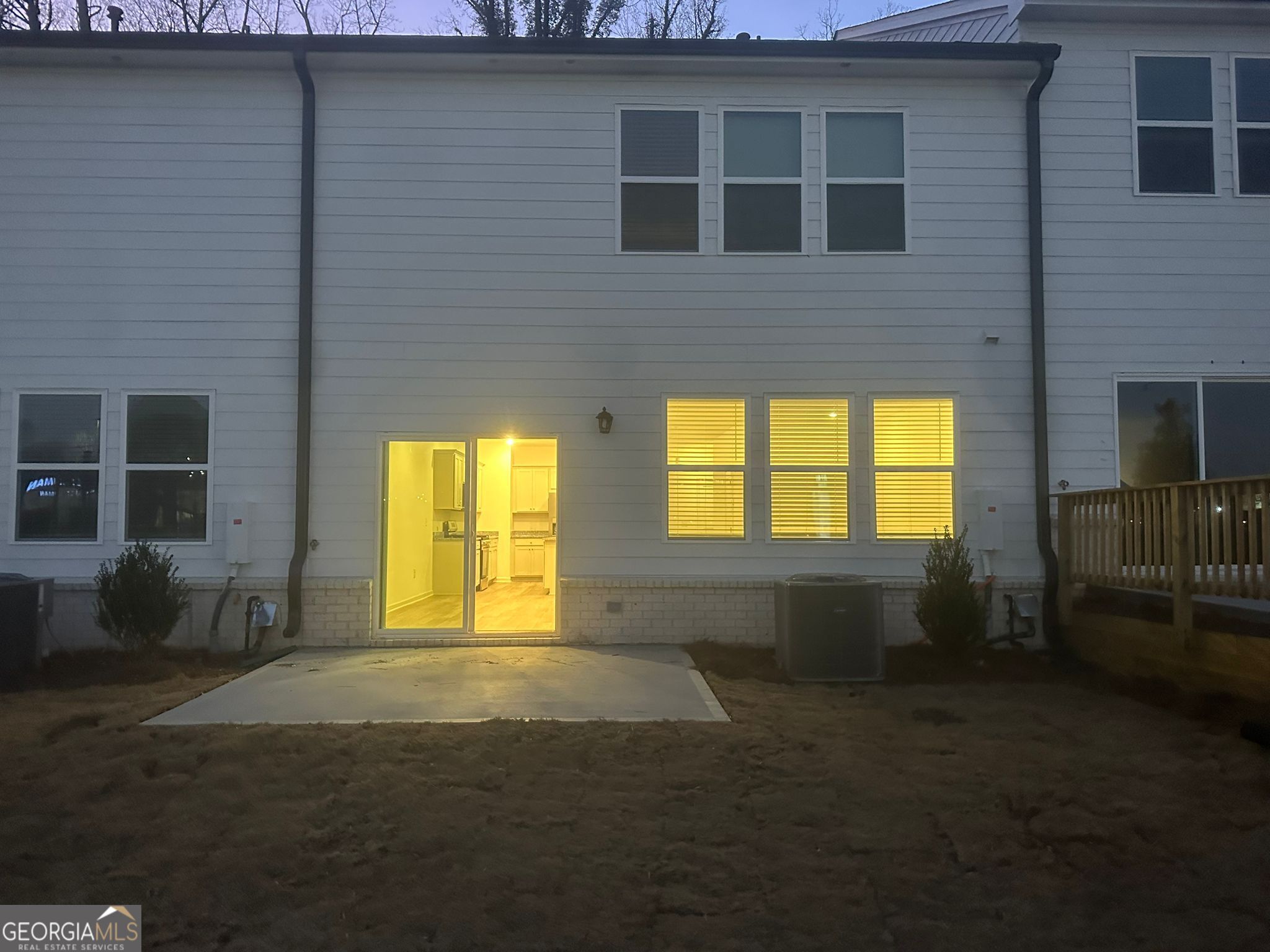 4281 Marsha Street Doraville, GA 30360 - Photo 4 of 38 a view of an empty room with a fireplace and a window